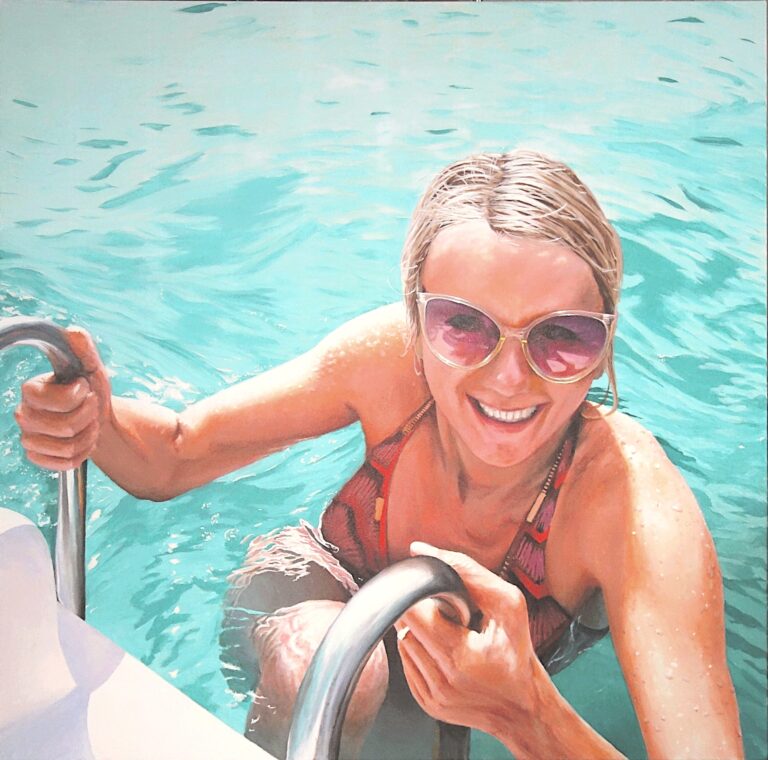 Woman climbing out of Lake Zell on to pedalo